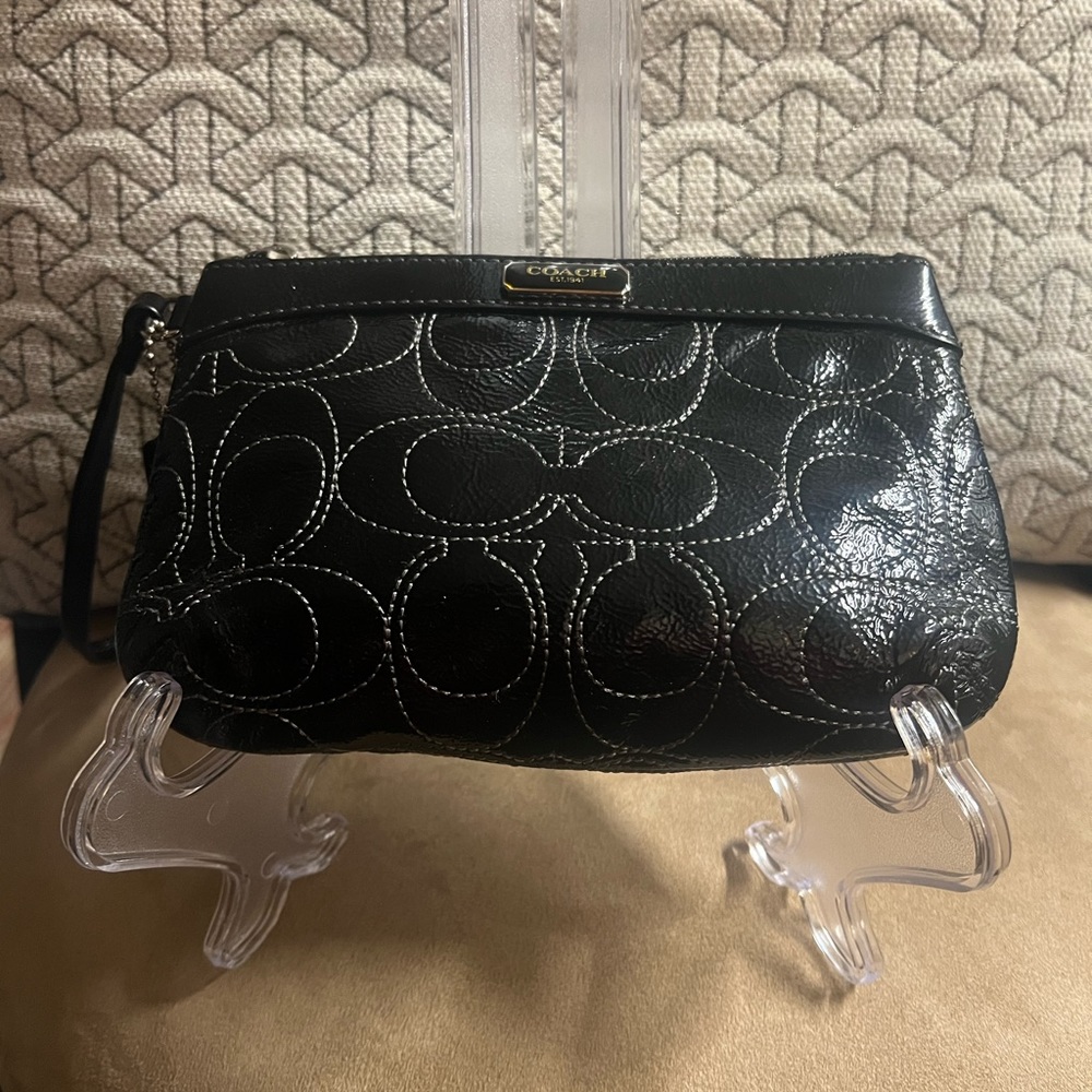 Patent Leather coach wristlet in excellent condition.